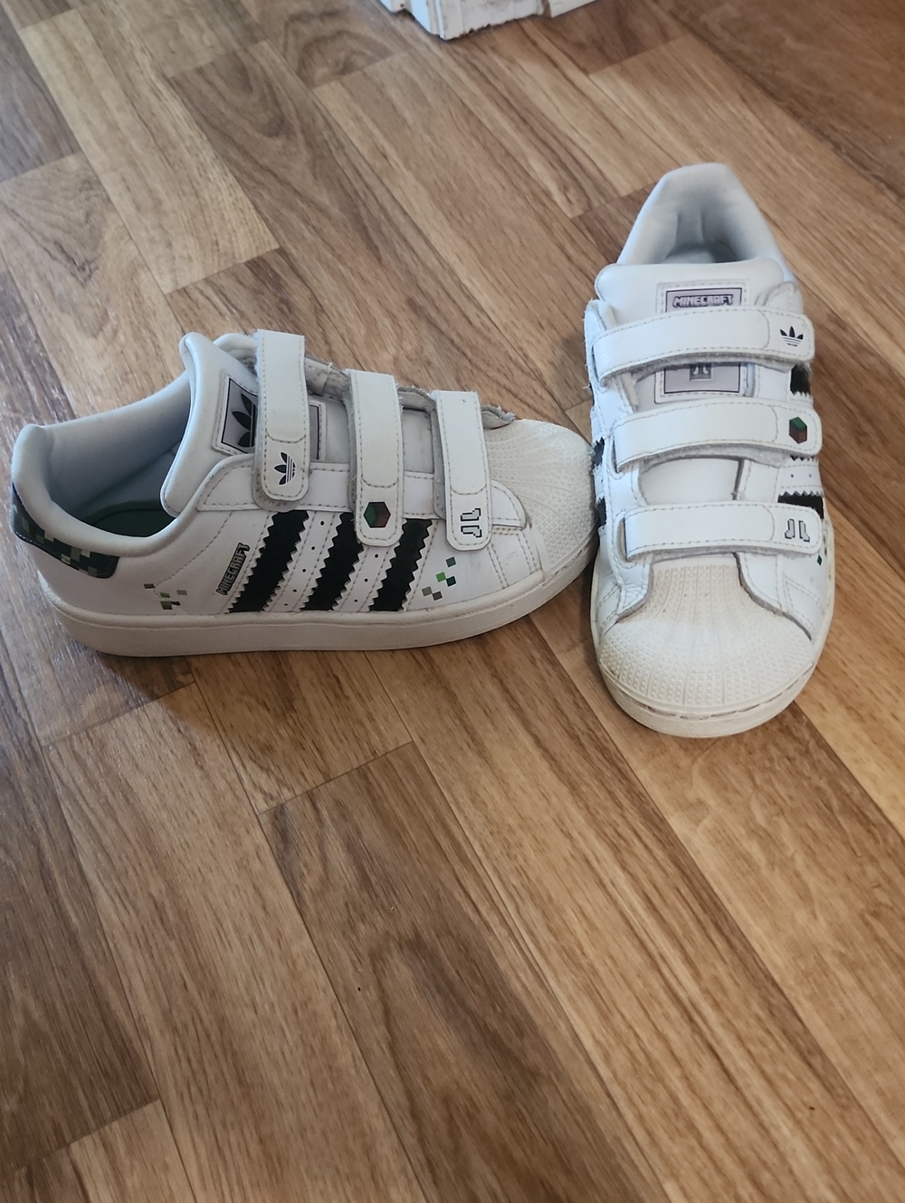 adidas Kids Minecraft White Sneakers with Black Stripes and Green Accents